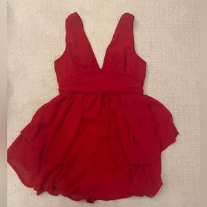 Red plunging cocktail dress.